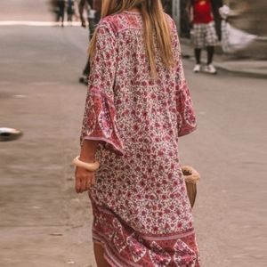 Bohemia style v collar hollow vacation dress